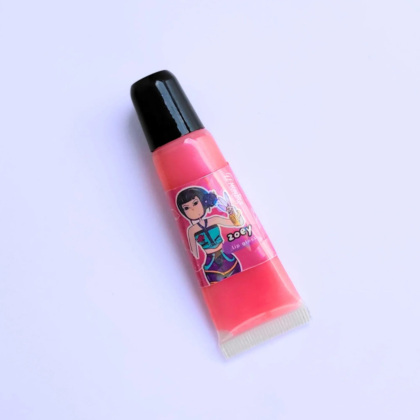 Lemon Box Beauty Zoey Anime Shine Lip Gloss - shimmering soft coral-pink vegan lip oil in a squeeze tube with custom K-pop Demon Hunter anime character artwork.