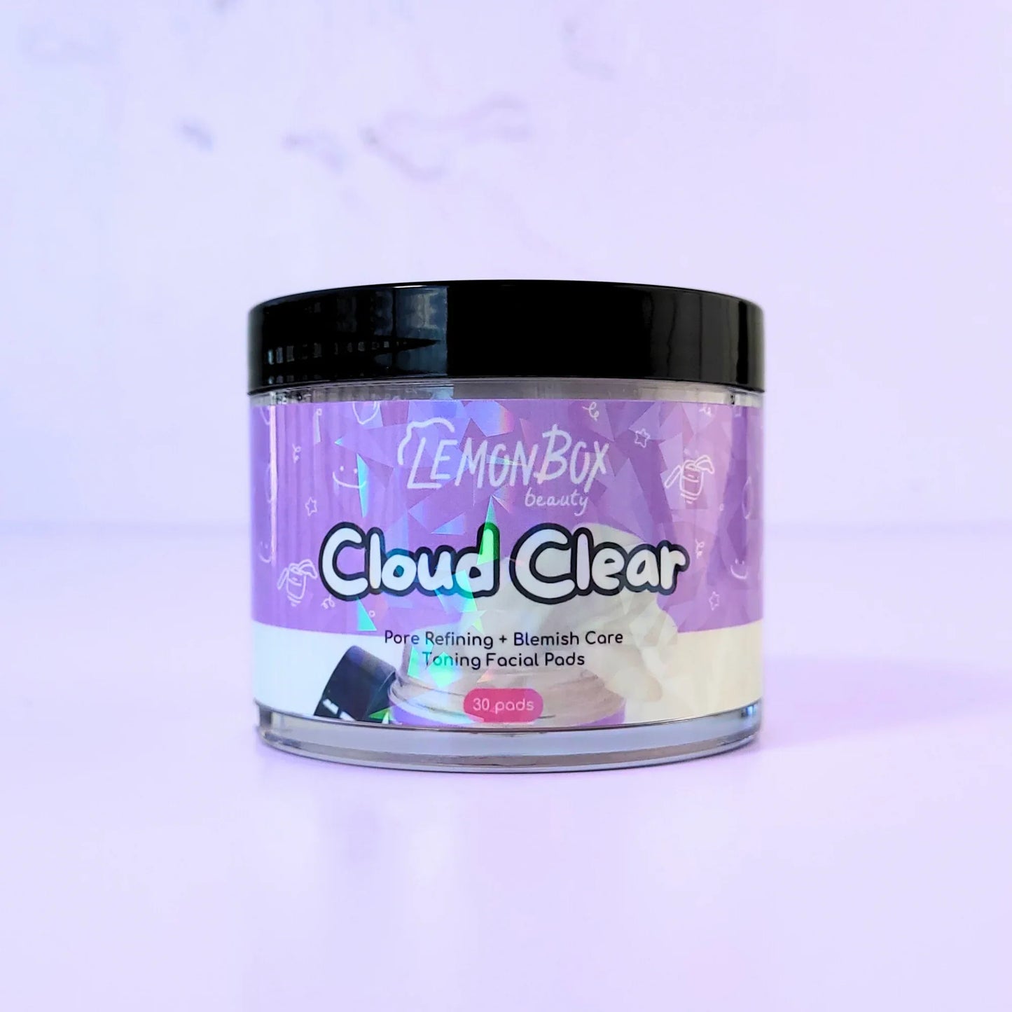 Jar of LemonBox Cloud Clear on a light purple background