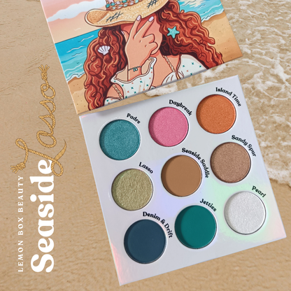 Makeup palette with colorful eyeshadows and a beach-themed illustration on the packaging.