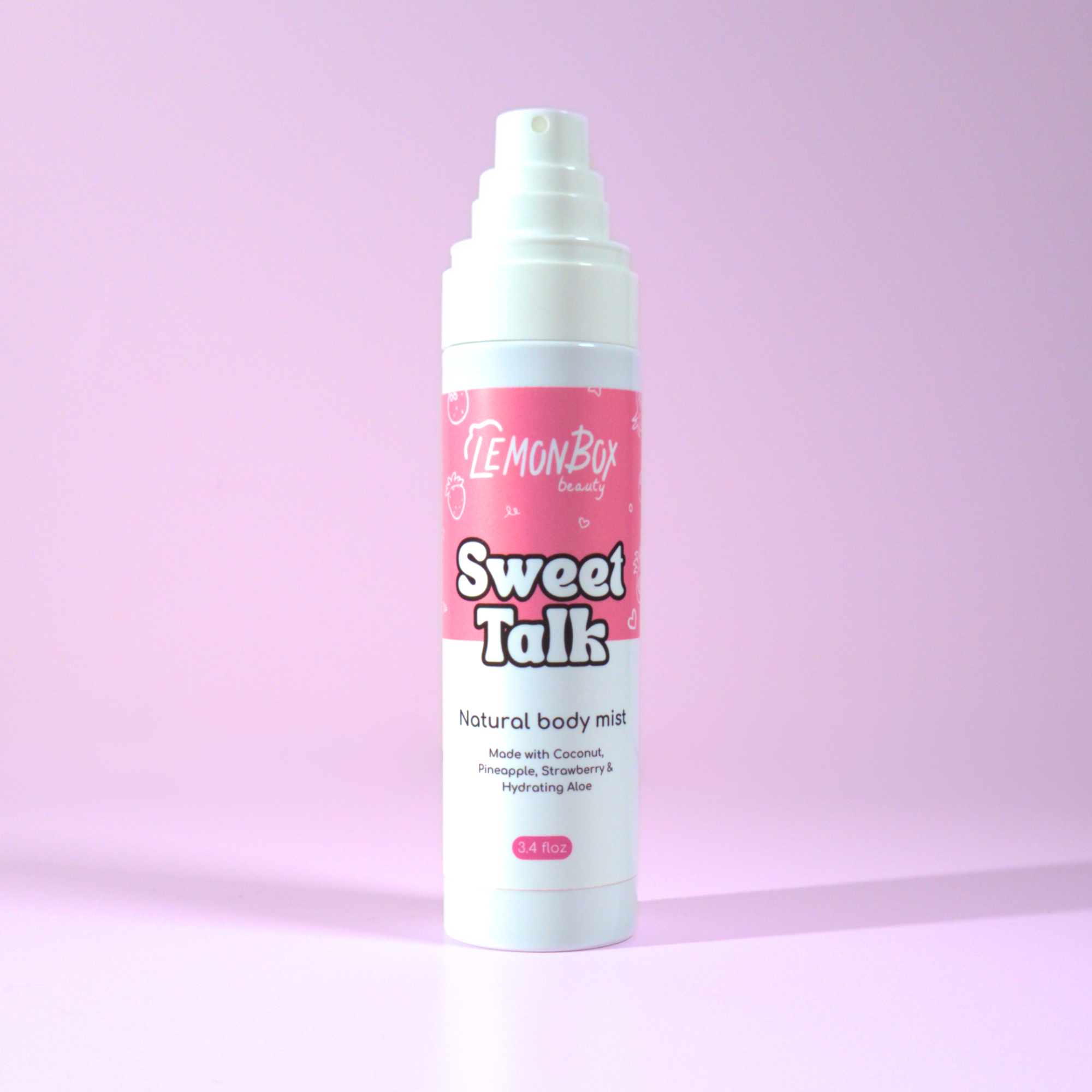 Lemon Box Sweet Talk natural body mist on a pink background