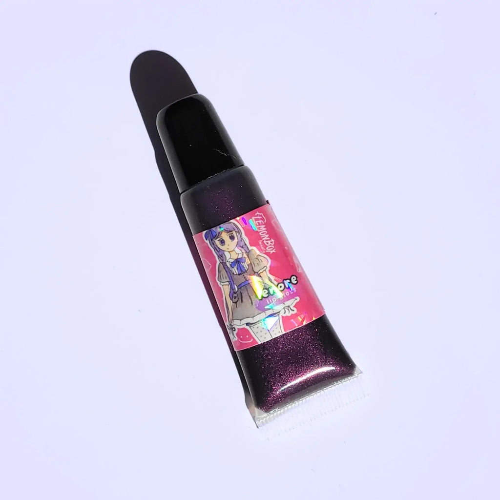 Lemon Box Beauty Lenore Anime Shine Lip Gloss - deep shimmering plum-purple vegan lip oil in a squeeze tube with custom dark coquette anime character artwork.