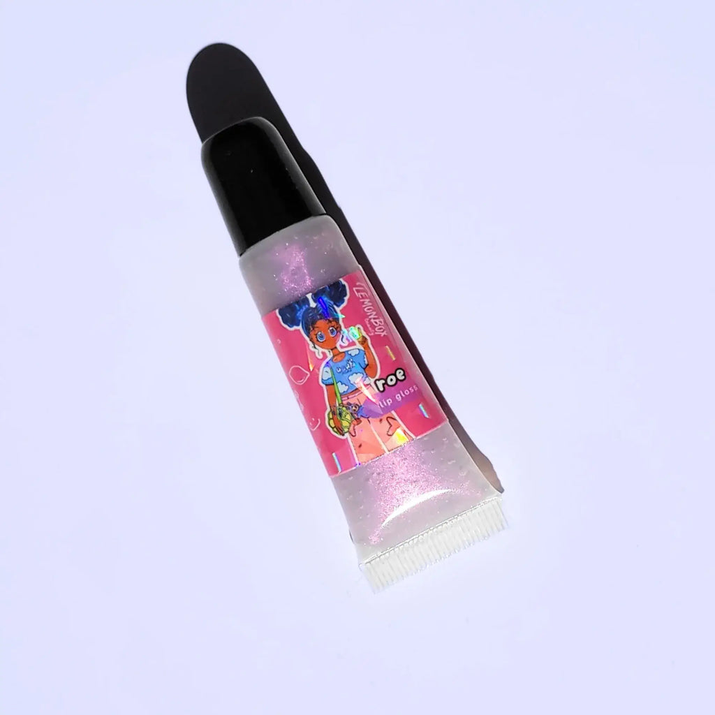 Lemon Box Beauty Roe Anime Shine Lip Gloss - translucent iridescent purple vegan lip oil in a squeeze tube with custom anime character artwork of a girl with blue space buns.