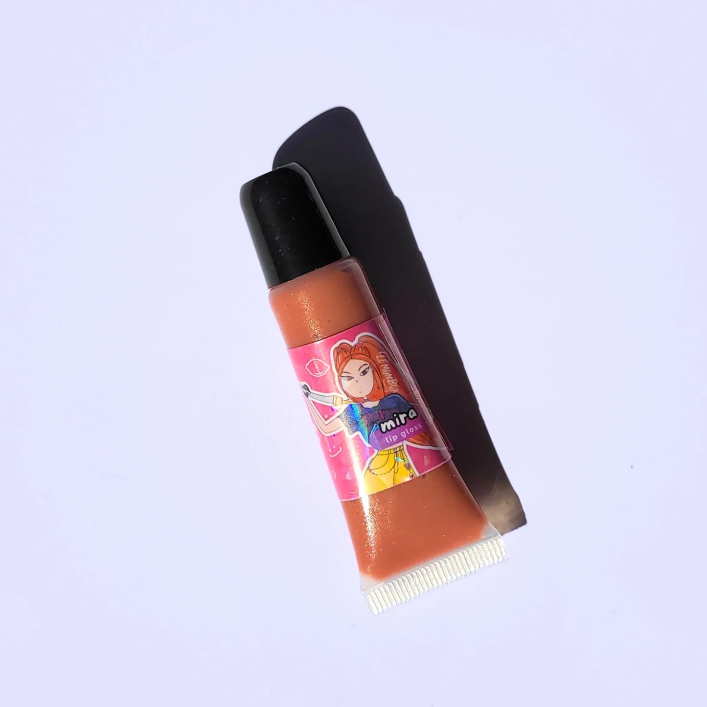 Lemon Box Beauty Mira Kpop Demon Hunter Anime Shine Lip Gloss - warm terracotta-nude vegan lip oil in a squeeze tube with custom anime character artwork.