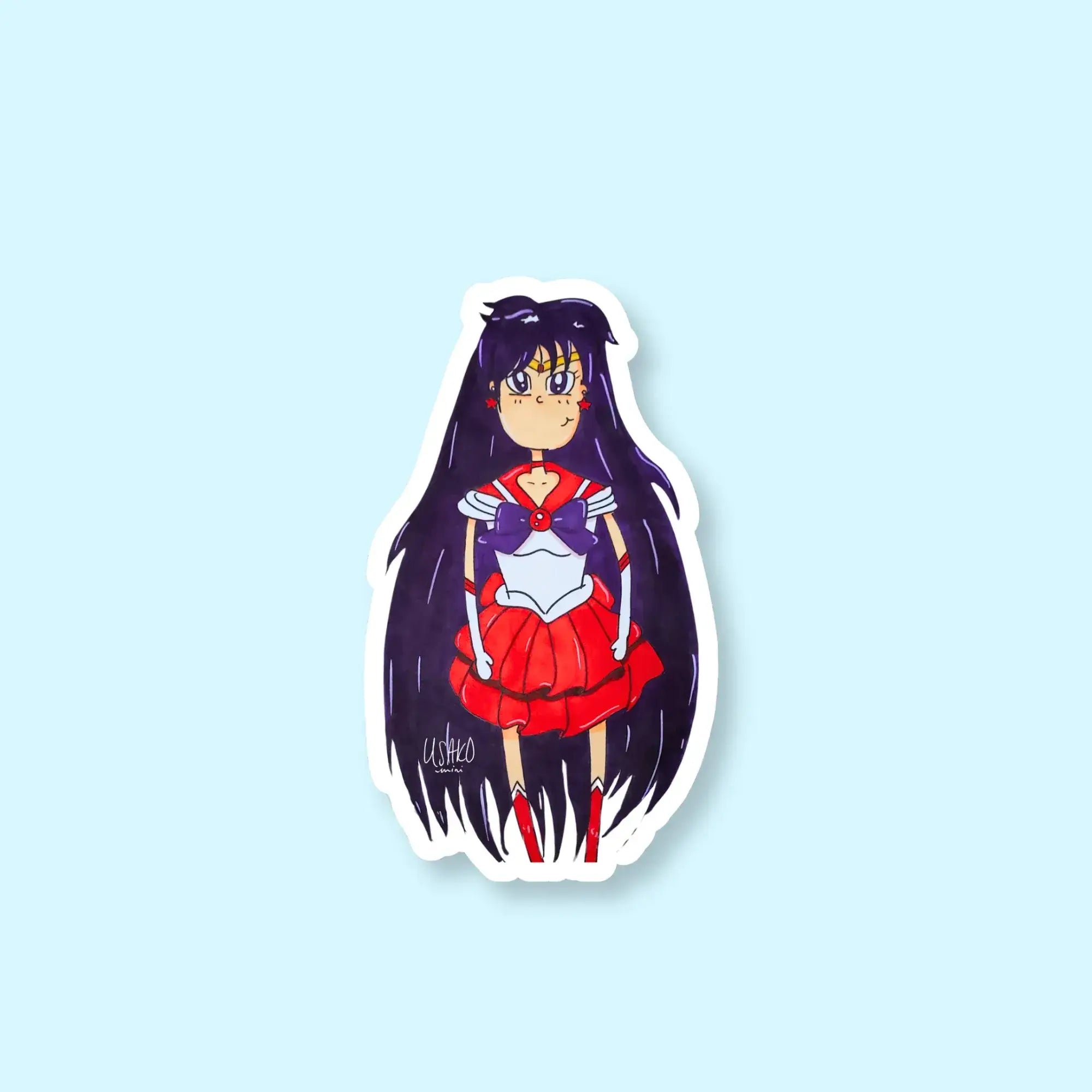 Sticker of Sailor Mars with long dark hair and a red outfit on a light blue background
