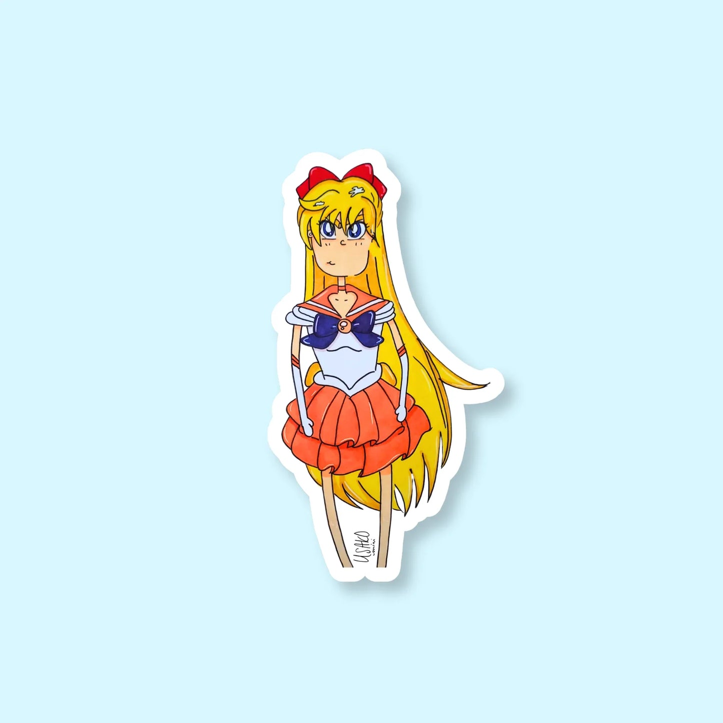 Sticker of an animated character of Sailor Venus with long yellow hair and a red headband on a light blue background