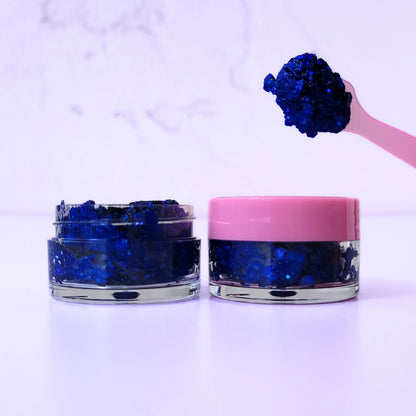 Lemon Box Beauty Blueberry Pop Glitter Jelli - deep cobalt blue chunky body glitter in a clear jar with a texture swatch on a pink spatula.
