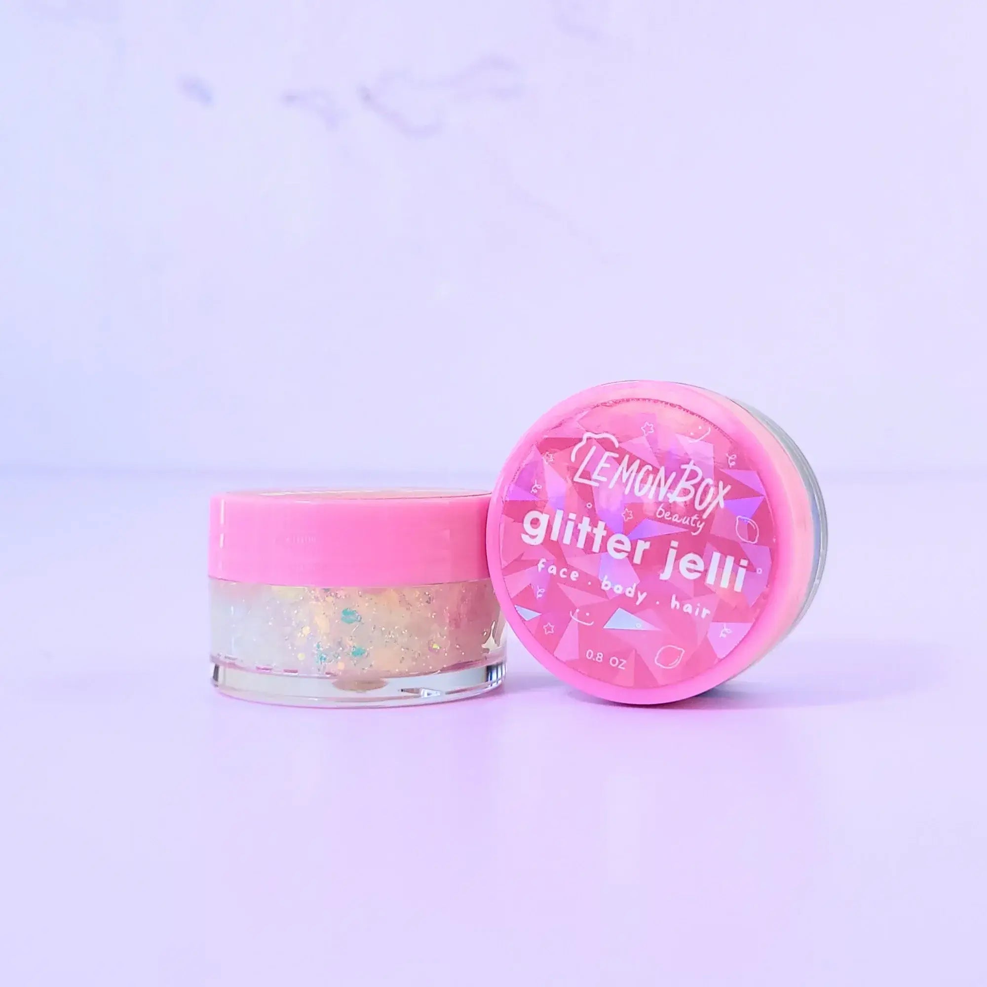 Lemon Box Beauty Frosted Glitter Jelli - iridescent white and silver chunky body glitter in a clear jar with a texture 