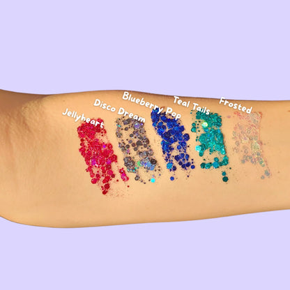 Lemon Box Beauty collection of four Glitter Jelli swatches—shades Jellyheart, Disco Dream, Mermaid Tails, and Frosted—showing chunky holographic and iridescent body glitter finishes.