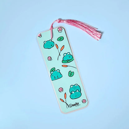 Green bookmark with Frog themed design on a light blue background