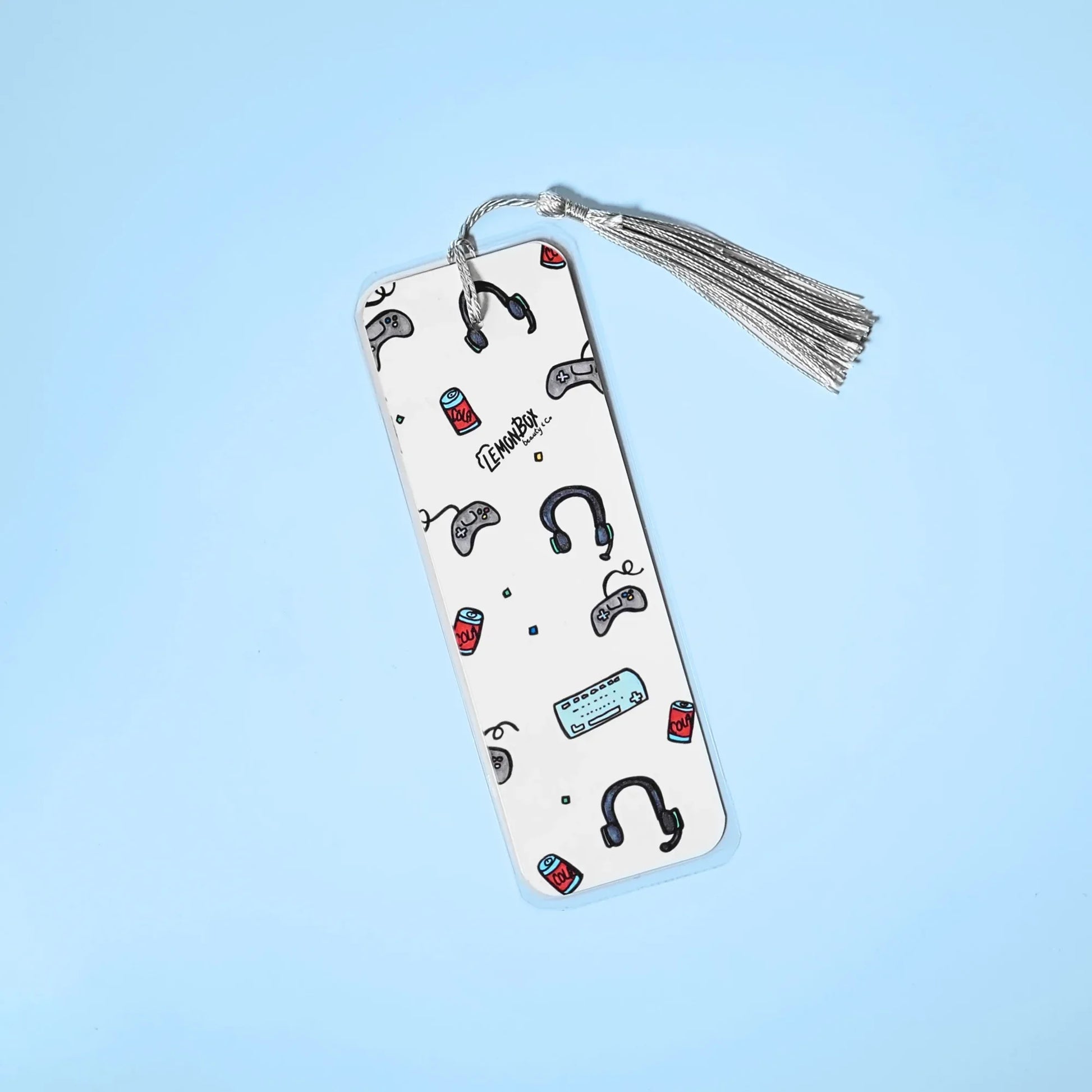 White bookmark with Gamer themed design on a light blue background