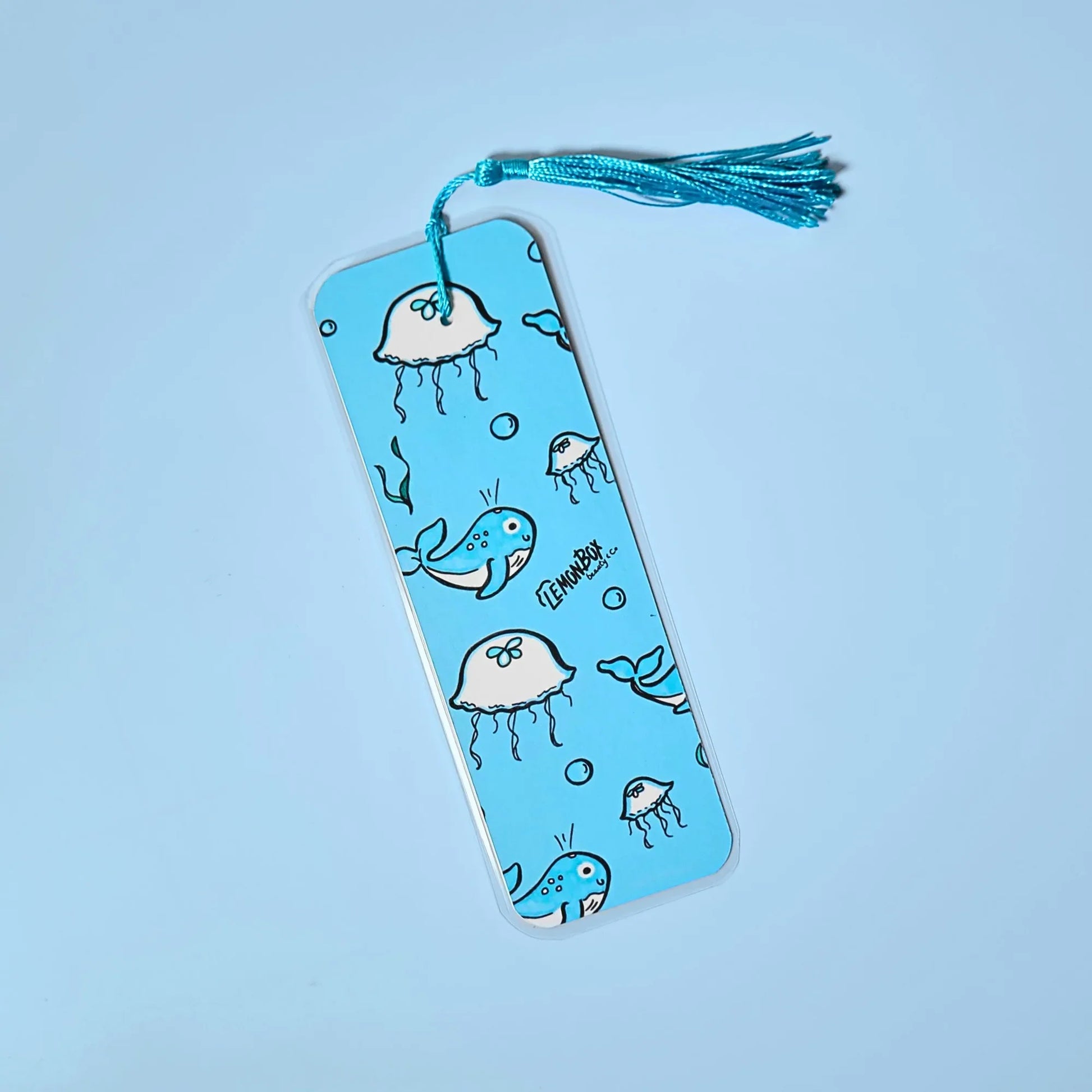 Blue bookmark with Jellyfish themed design on a light blue background