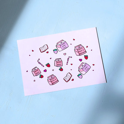 White Greeting Card with Strawberry Milk Themed design on a light blue background