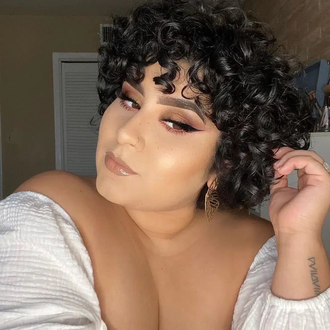 Woman with styled hair posing indoors wearing lets brunch eyeshadow palette
