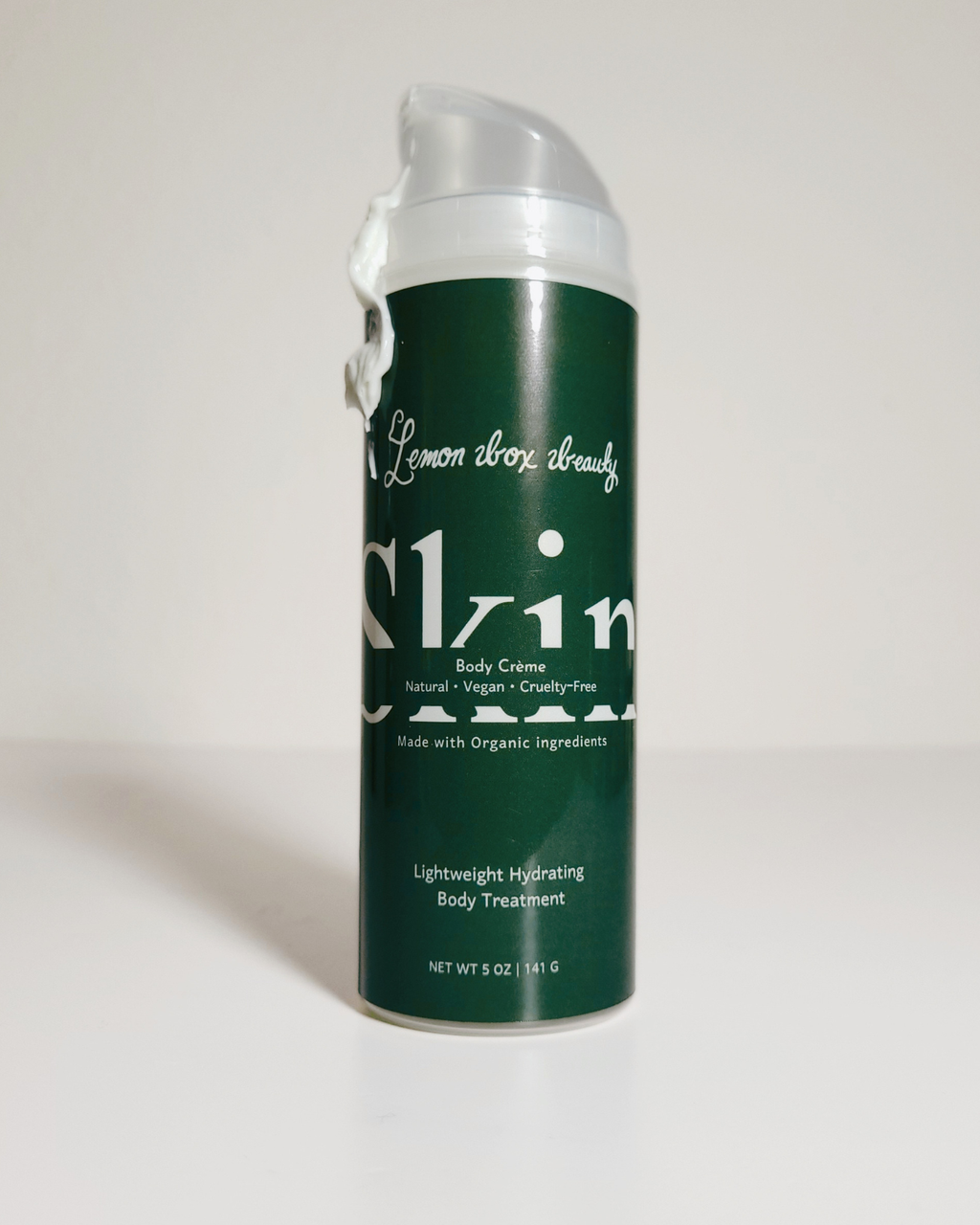 A single can of Skin of America Lemon Aloe Body Cream standing upright on a plain white studio background.