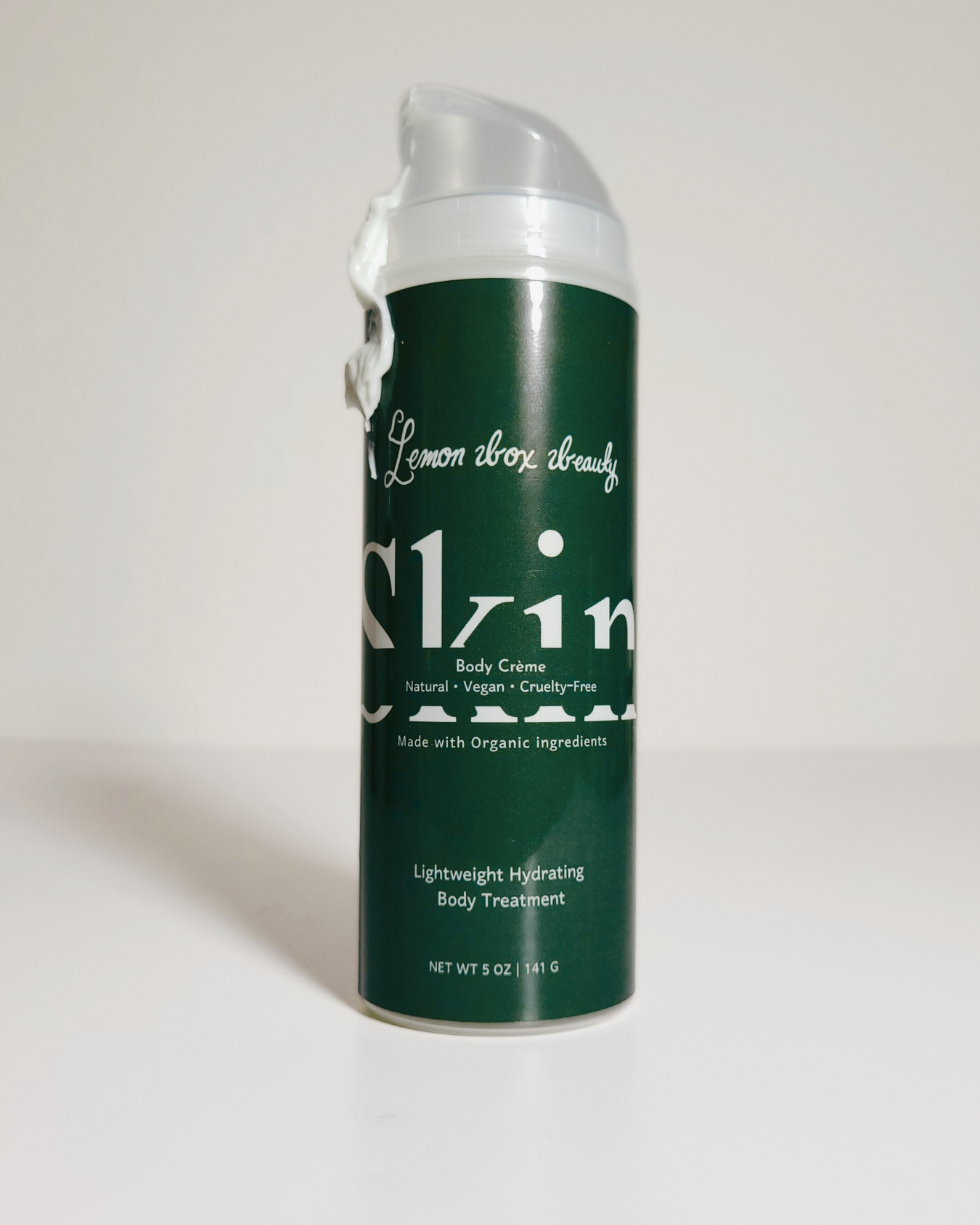 A single can of Skin of America Lemon Aloe Body Cream standing upright on a plain white studio background.