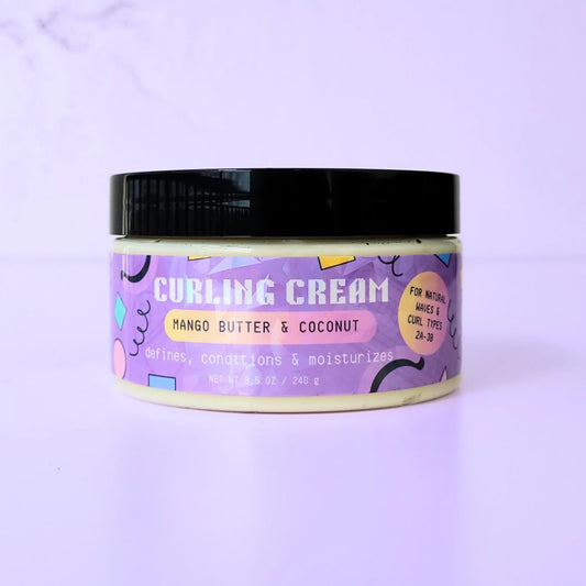 An 8.5 oz jar of LemonBox Beauty Curling Cream featuring Mango Butter and Coconut, with a purple geometric label and a black lid, set against a soft lavender background.