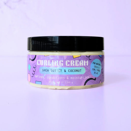 An 8.5 oz jar of LemonBox Beauty Curling Cream featuring Shea Butter and Coconut, with a blue and purple geometric label and a black lid, set against a soft lavender background.