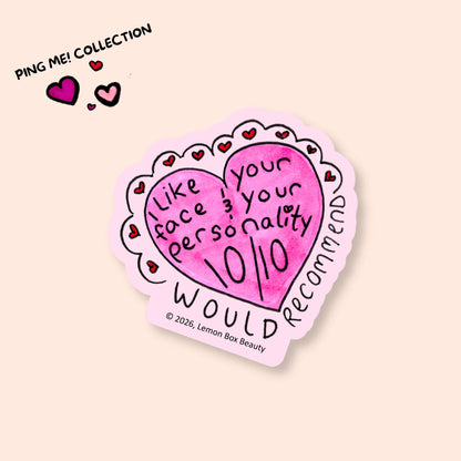 Pink heart-shaped sticker with text on a beige background, featuring the 'Ping Me! Collection' branding.