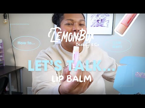 Rochelle Lowery holding the Lip Balm Showcasing its items