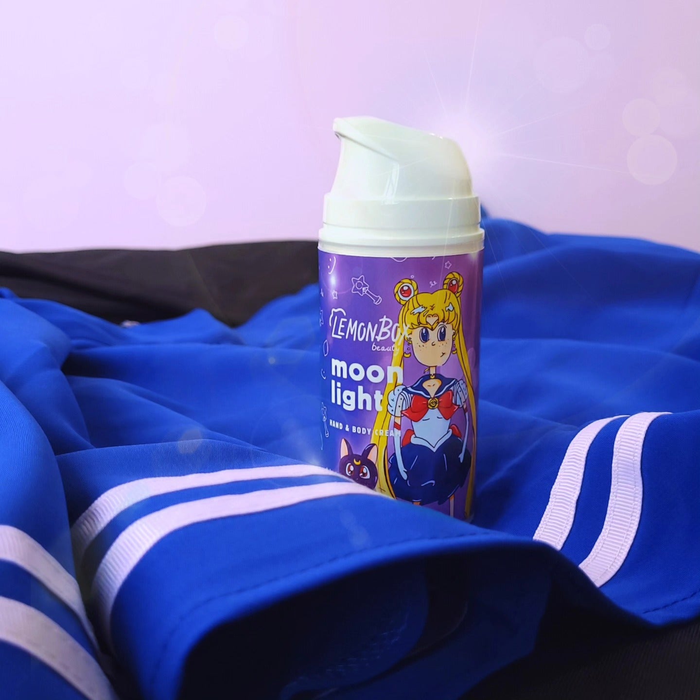 Lemon Box beauty  'moon light' product on a blue fabric background